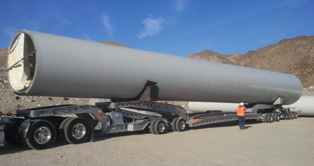 110 ft. wind tower section on a Cozad 9-axle trailer 110 ft. wind tower section on a Cozad 9-axle trailer