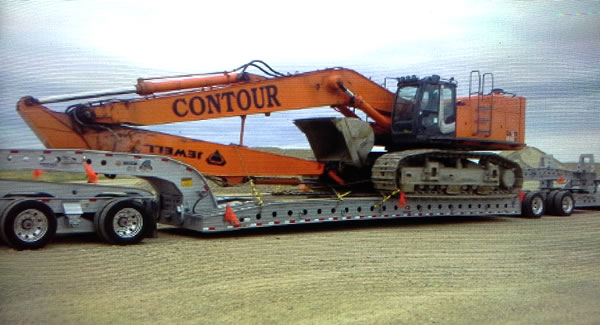 Cozad 9-Axle Steerable with deck extensions work in Canada Cozad 9-Axle Steerable with deck extensions work in Canada