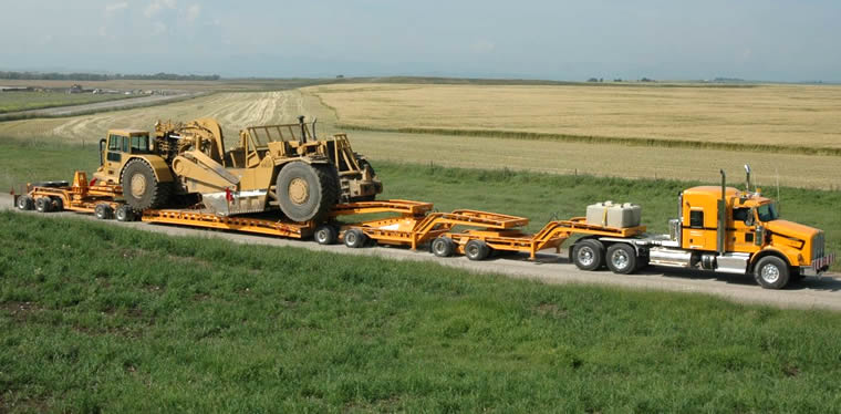 Cozad 9 axle with double 16 tire Jeep setup working in Canada