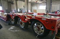 Cozad 60 Ton 3+2 28' Deck 11' Hydra Neck with 2 Axle Booster