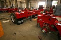 Cozad 60 Ton 3+2 28' Deck 11' Hydra Neck with 2 Axle Booster